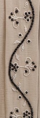 Black bead wave and ivory bead flowers on the Stone Wave Abaya