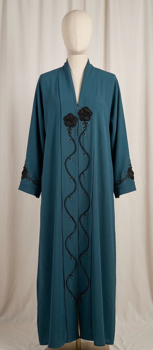 Teal Rose Vine Abaya on a dress form